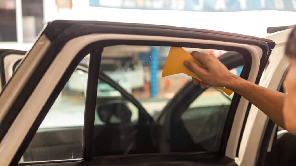 technician installing car window tint 2025 04 02 10 18 33 utc scaled